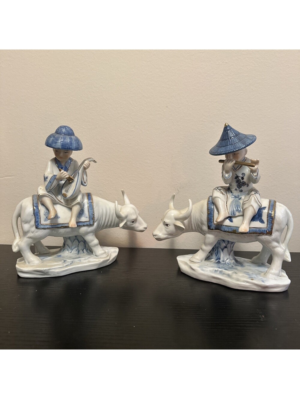 Seizan CF Porcelain Set Of Two Boys Playing Instruments On Bulls In Blue/white